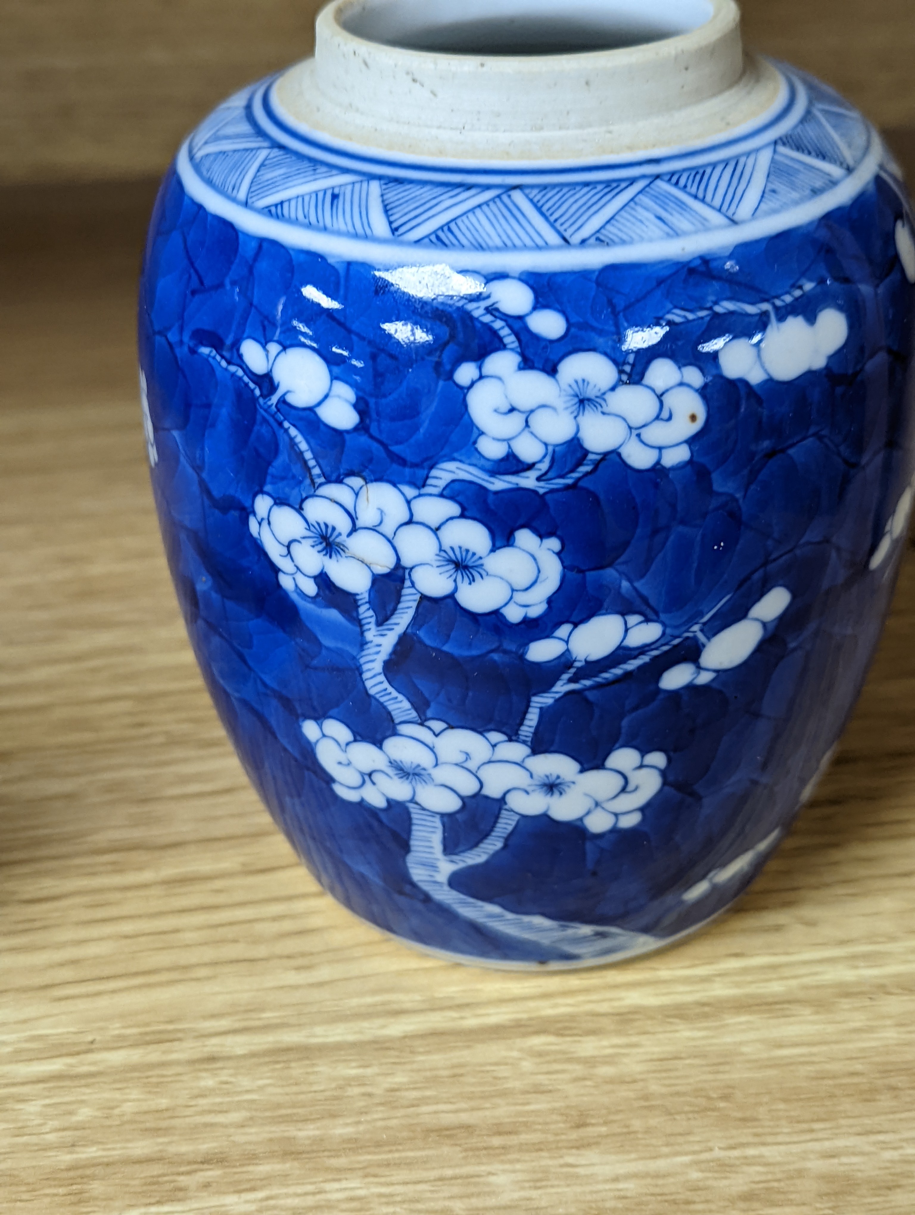 A 19th century Chinese blue and white prunus jar 13.5cm